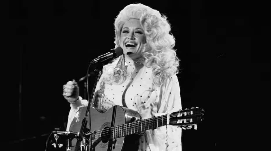 Parton's famously glamorous look was part of a carefully constructed public persona..png