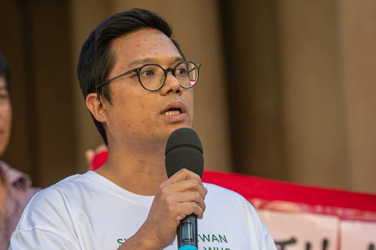 Man holding microphone.