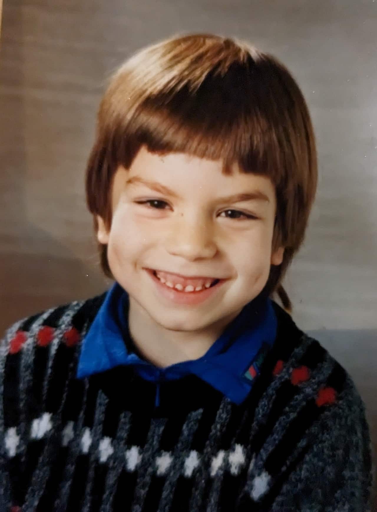 A young boy smiling 