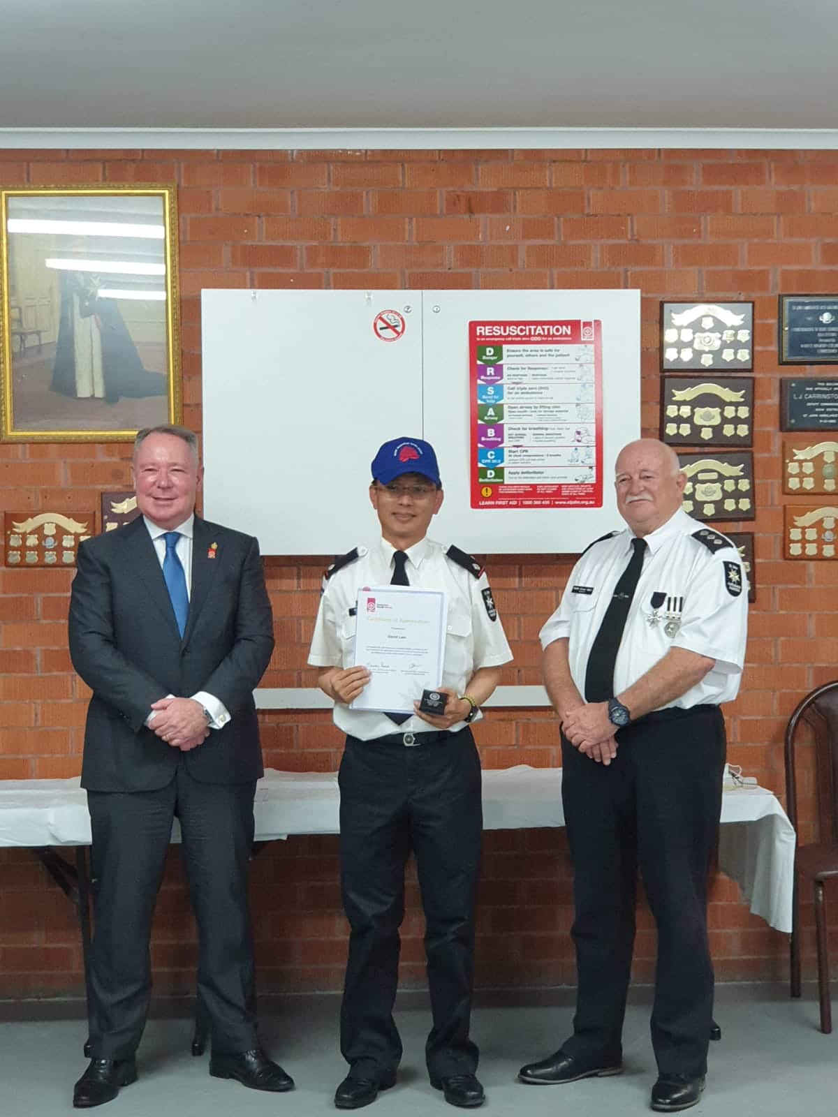 David, centre, receiving the NSW Premier's Bushfire Emergency Citation for contribution and service to the NSW Bushfires 2019-2020 emergency response.