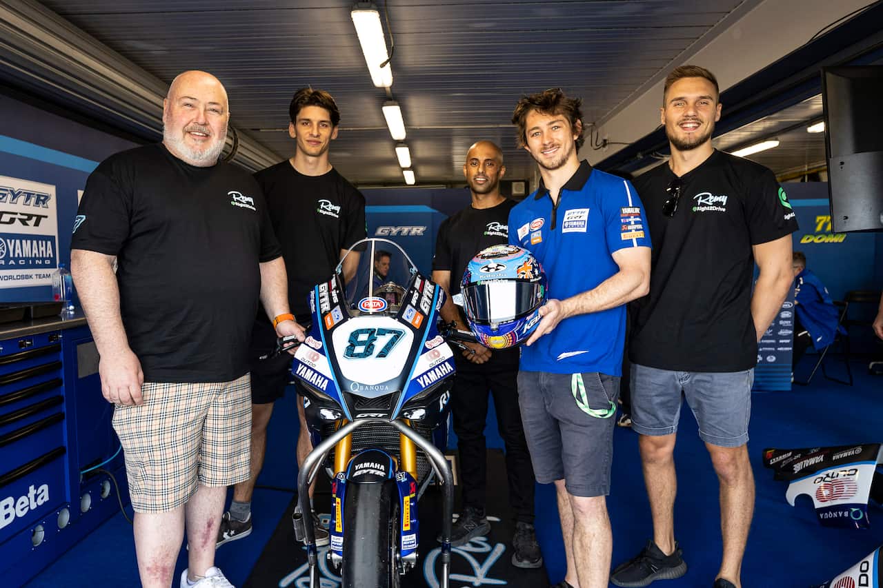 Remy Gardner with James Tonna and the Right2Drive team.