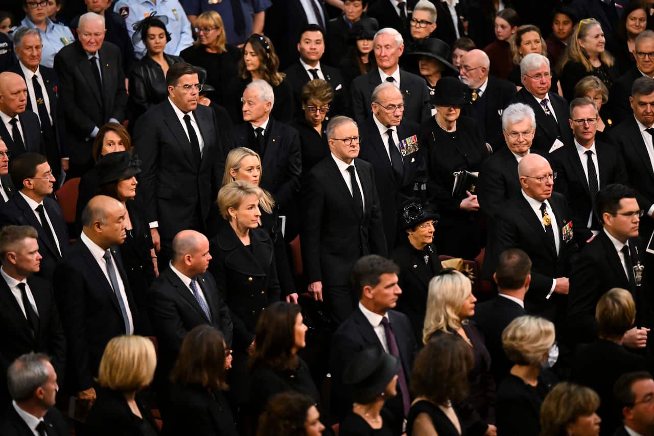 A crowd of people at the national memorial service in Canberra.