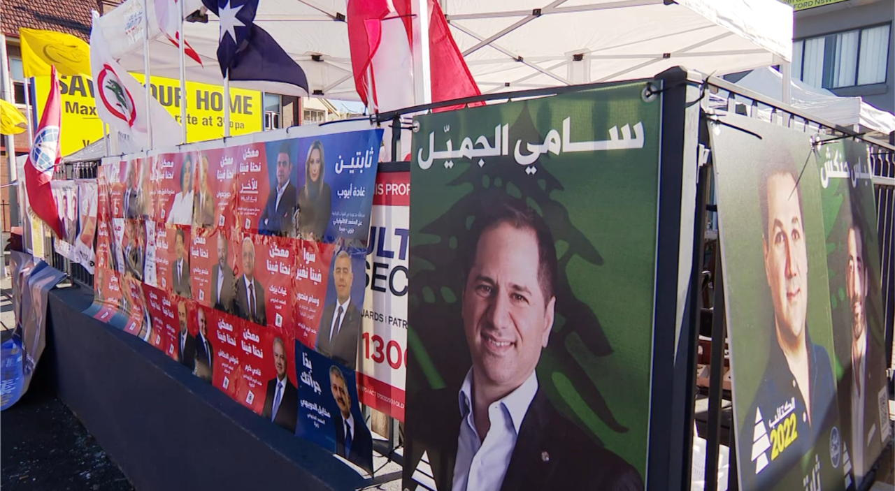 Banners span across a gate at the Lebanon election polling centre in Sydney.