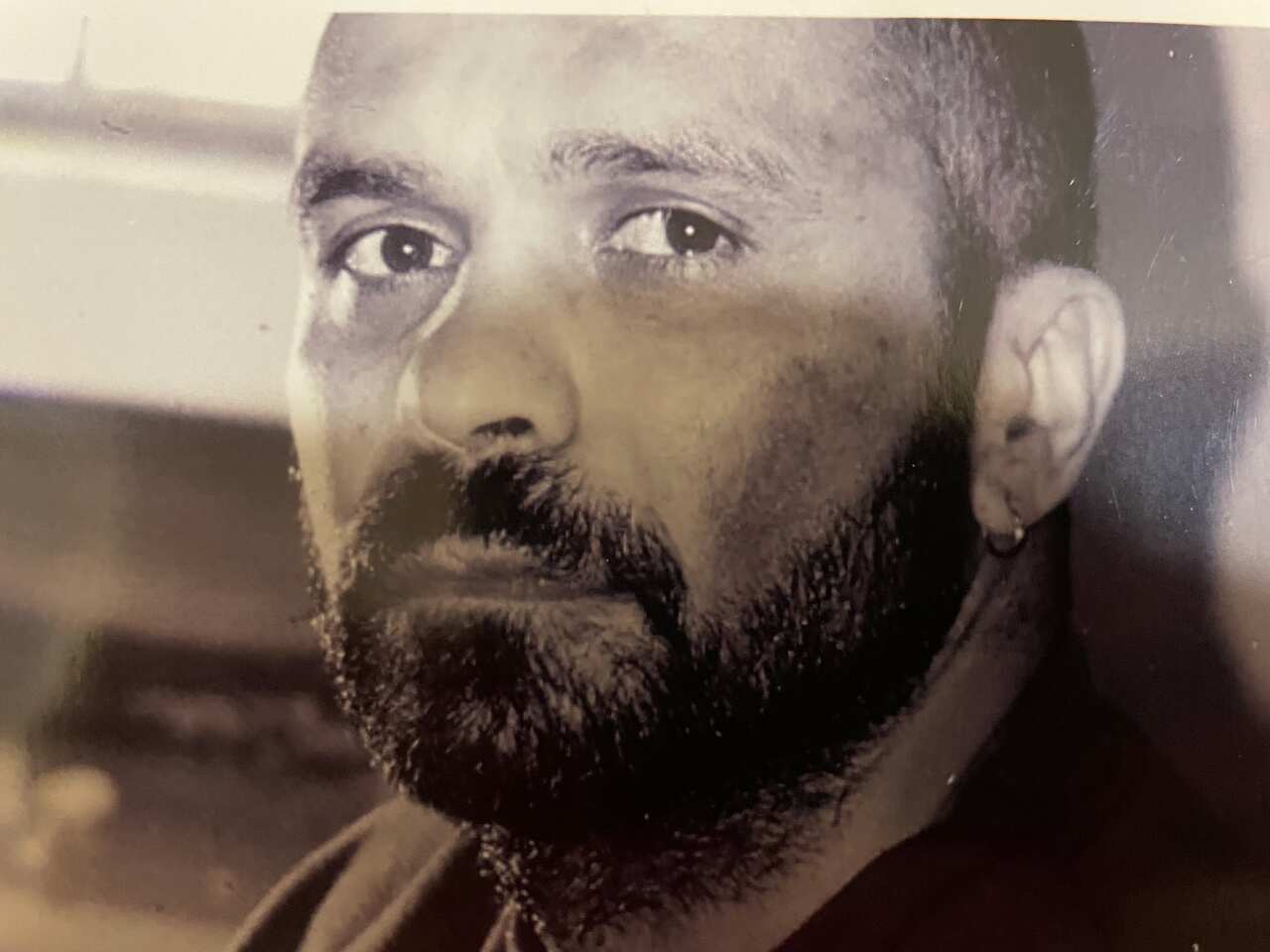 A black and white photo of a man