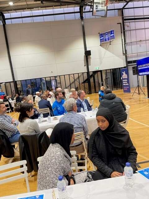 Guests attending the iftar dinner hosted by the North Melbourne footy club.