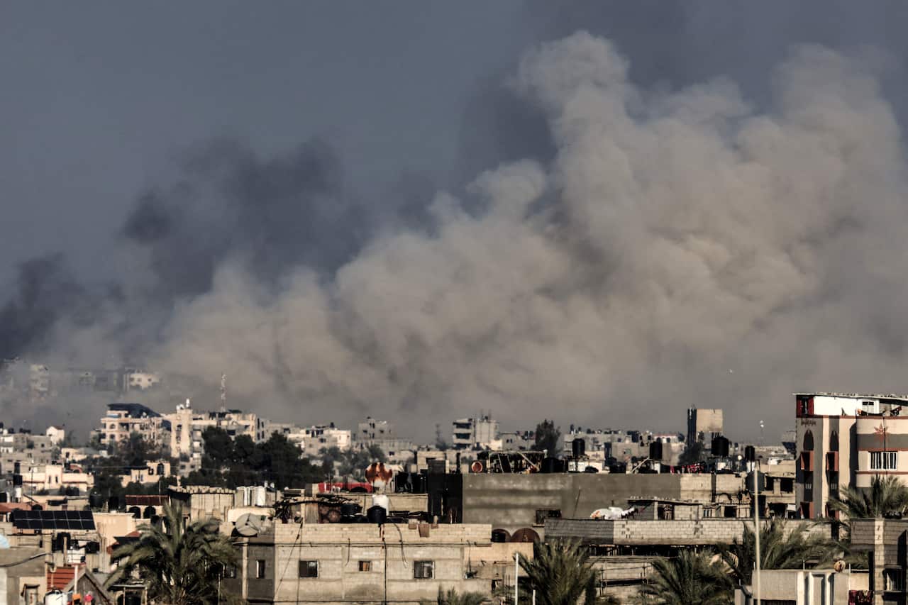 A large plume of smoke rises over Gaza 