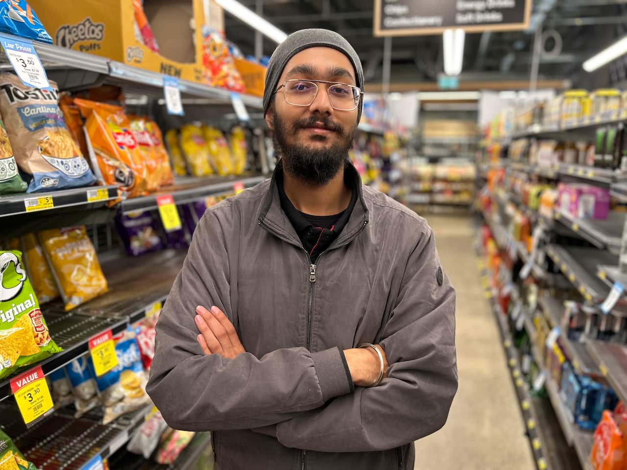 Naunihal Singh standing in a Melbourne supermarket.