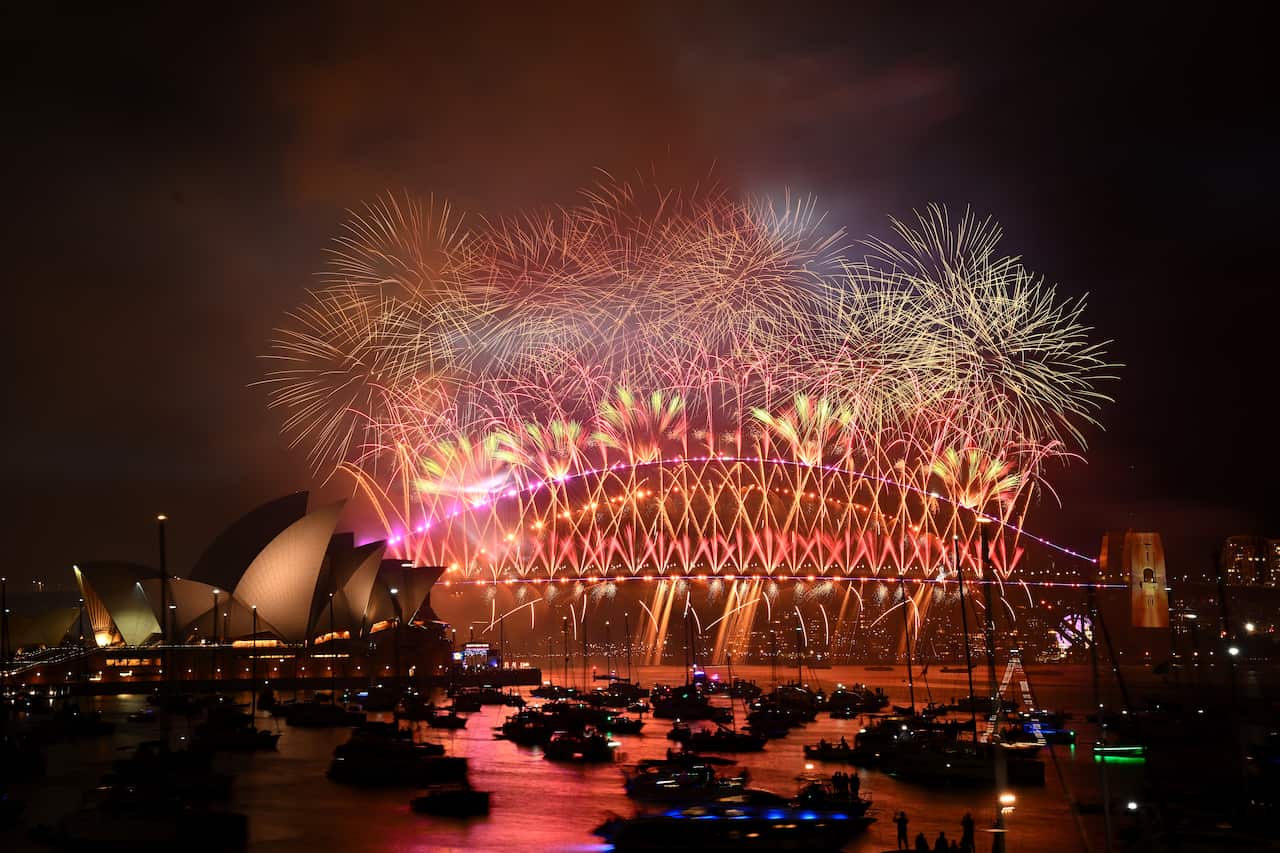 Fireworks are seen over the Sydney Opera House and Harbour Bridge during New Year’s Eve celebrations in Sydney