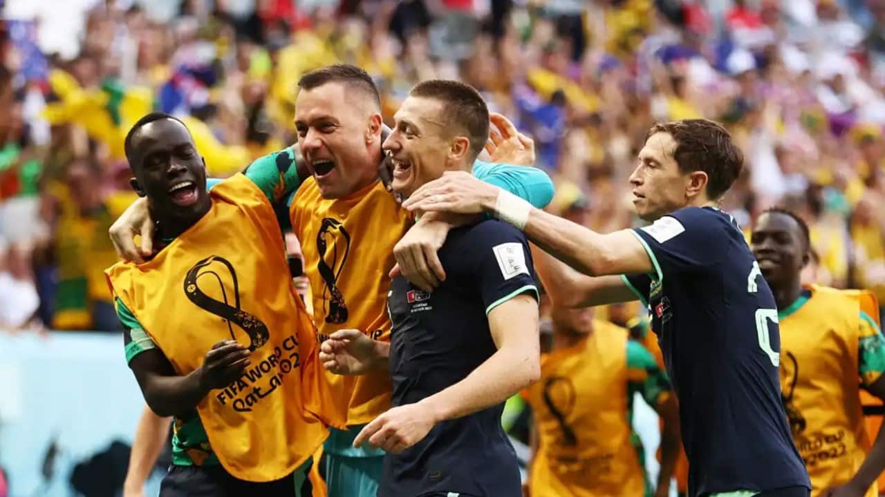 Celebrations after Socceroos striker Mitch Duke scores the team's winning goal.jpg