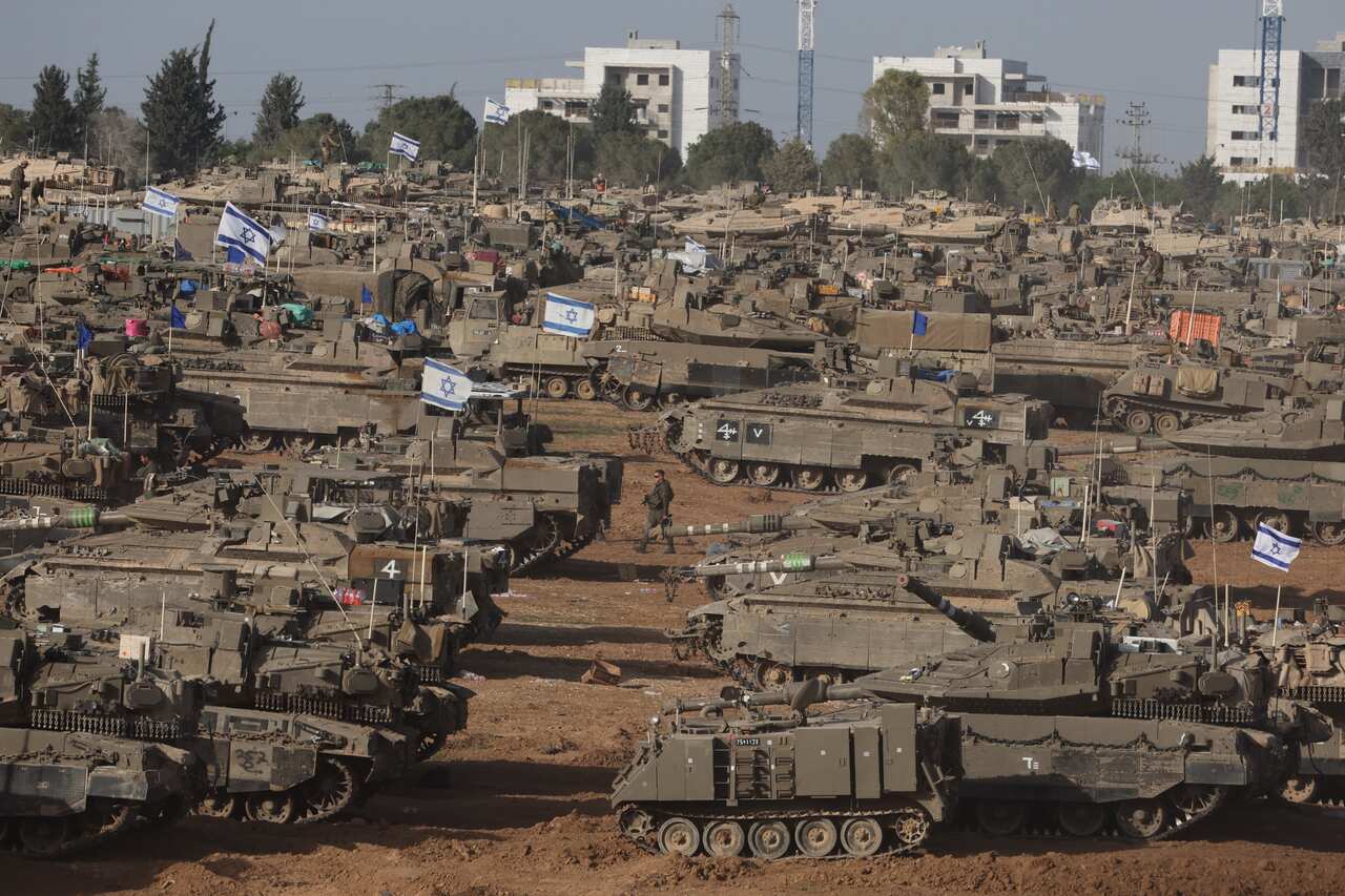 Israeli troops gather near the Gaza border, southern Israel