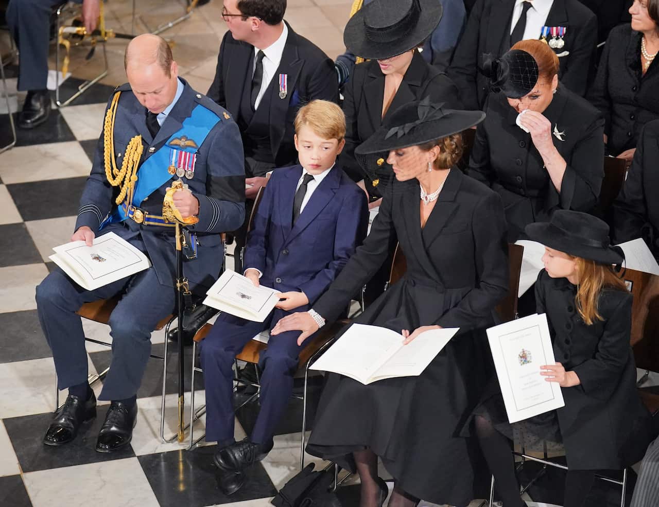 The Prince of Wales, Prince George, the Princess of Wales, and Princess Charlotte at Queen Elizabeth II's funeral.