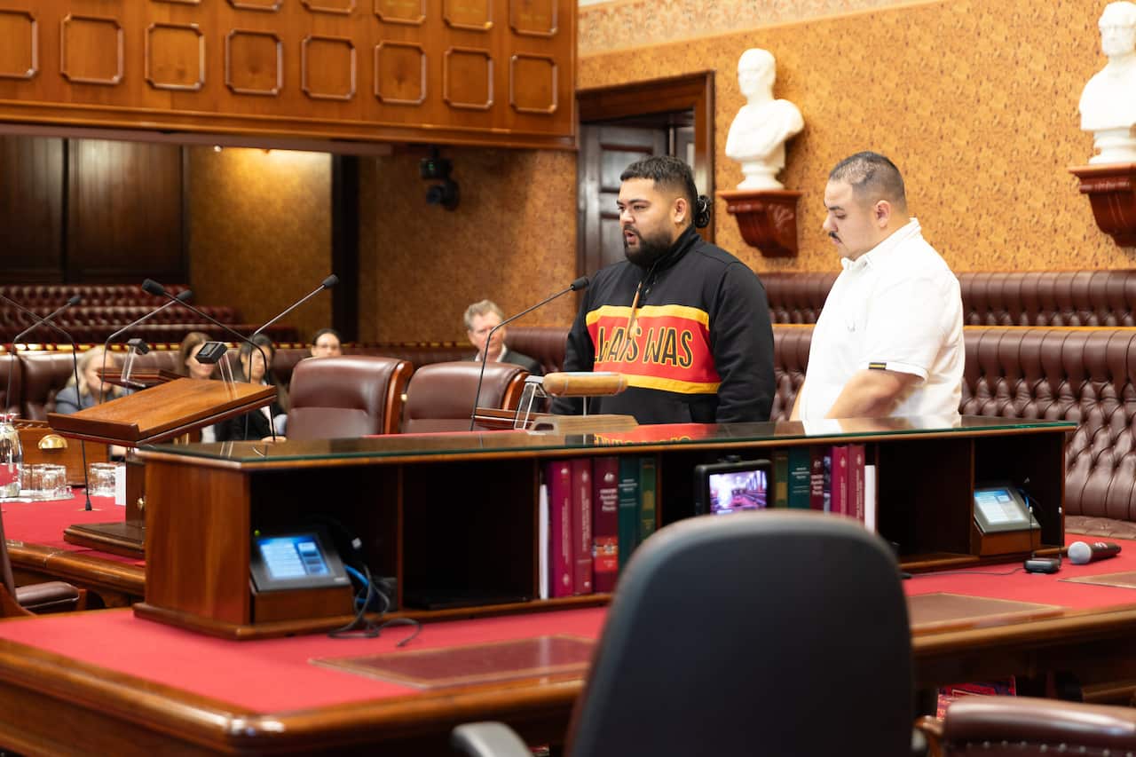 Malek Lyons and Bradon Lyons delivering their speech in the Legislative Council Chamber.jpg