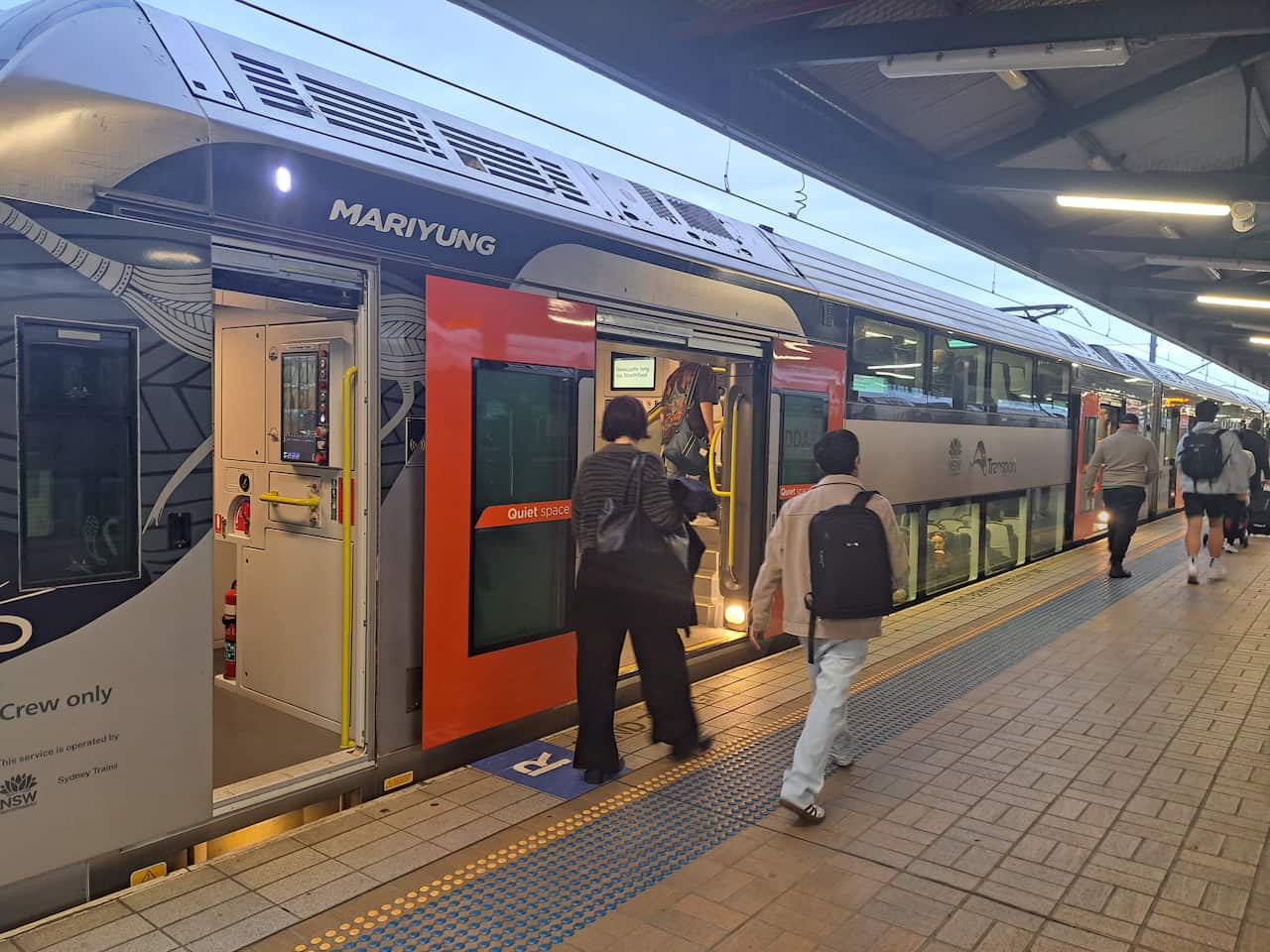 Passengers boarding a train.