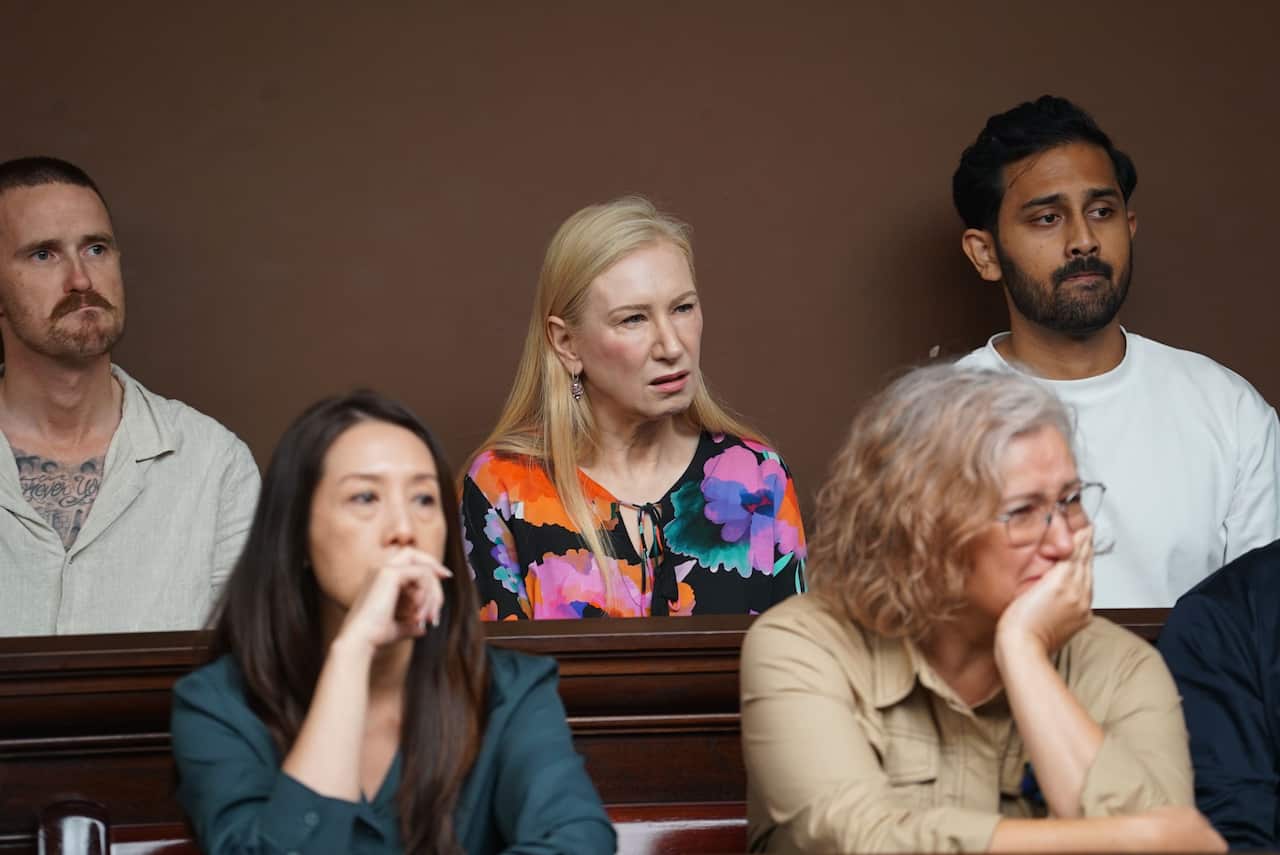 Five people are pictured looking shocked and sad