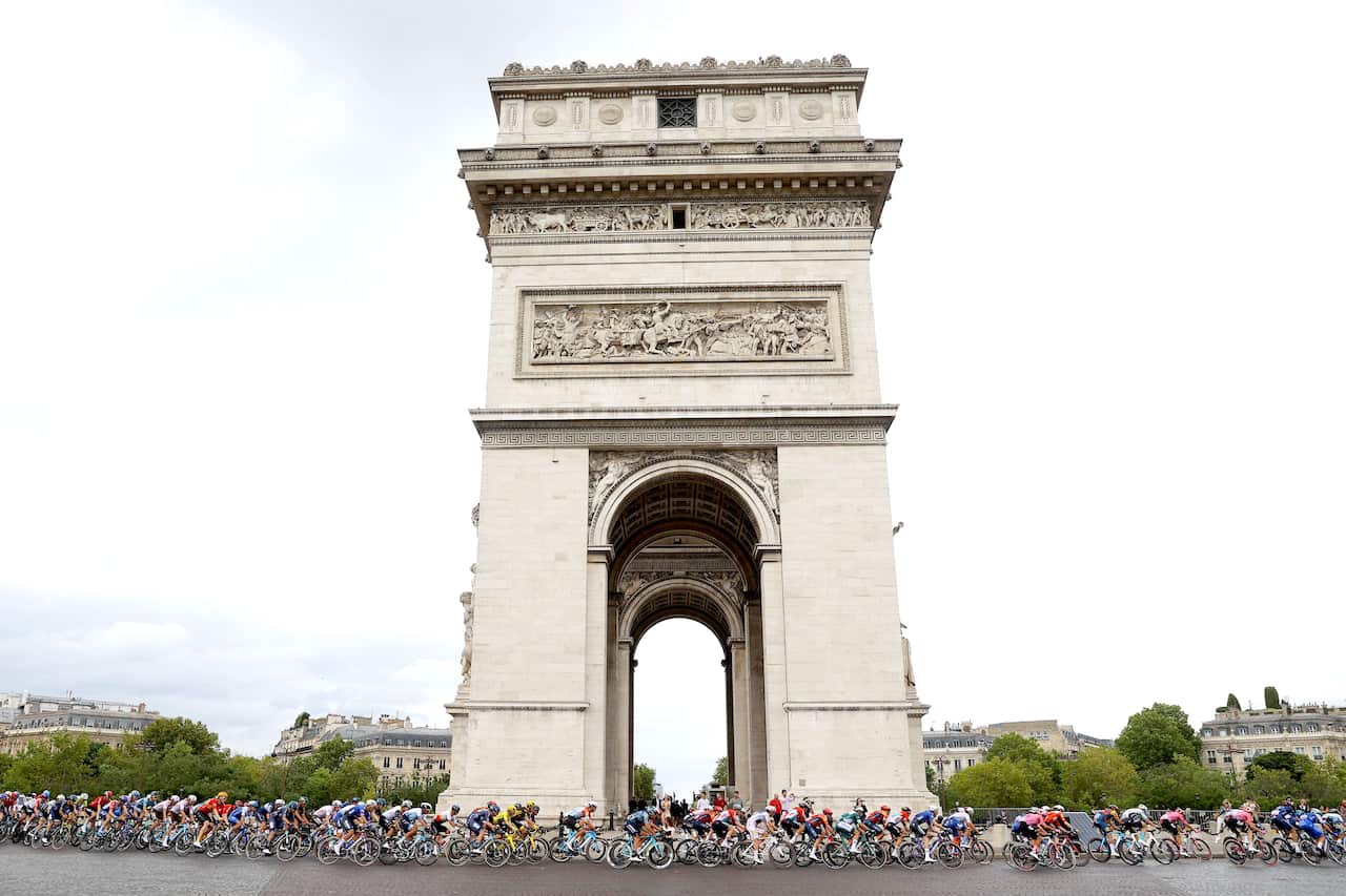Racers passing the Arc de Triomphe during the Tour de France