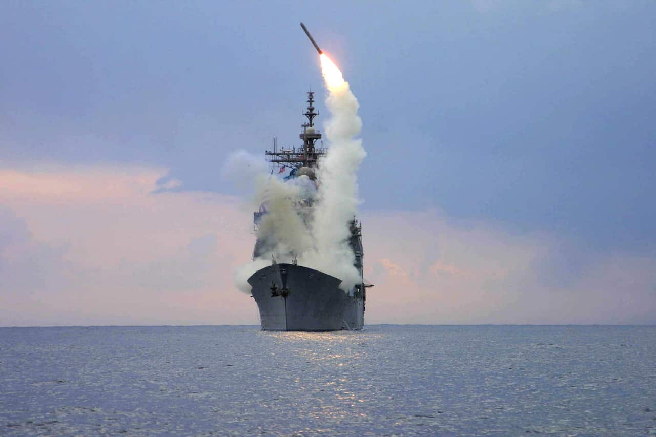A missile being launched from a US navy ship 