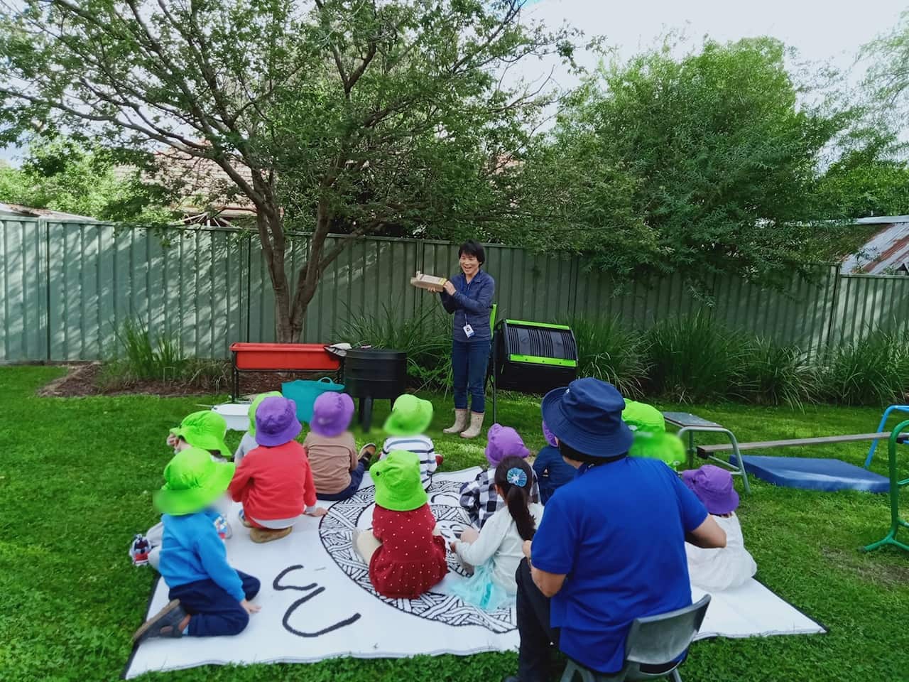 FrancesFisk Children learning how composting and worm farmiing work.jpg