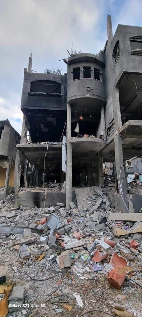 Burnt out shells of buildings are seen with rubble surrounding them in Gaza.