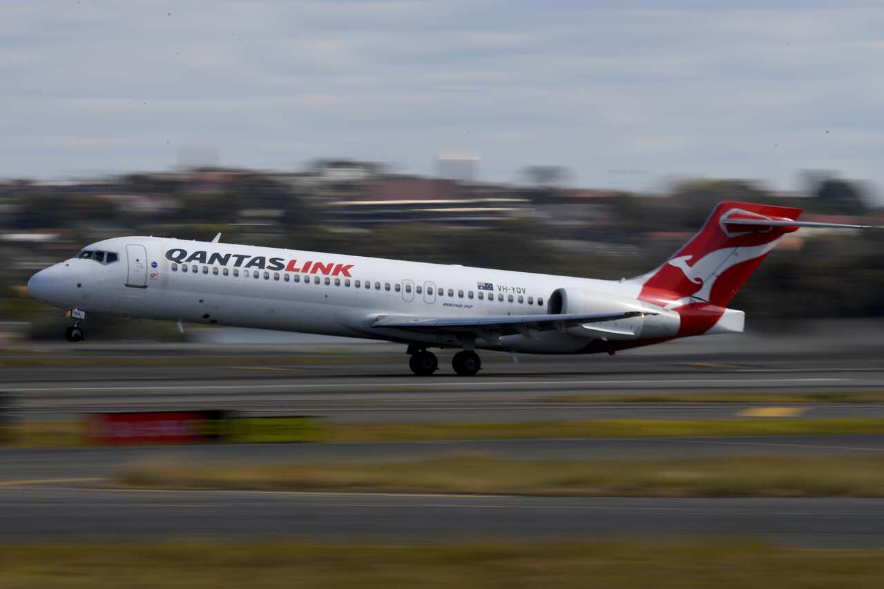A Qantas Boeing 717 aircraft taking off