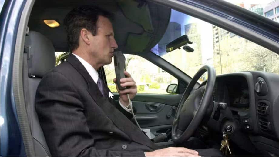 Co-developer of the alcohol ignition interlock device Rod Tatersall illustrates its use.png