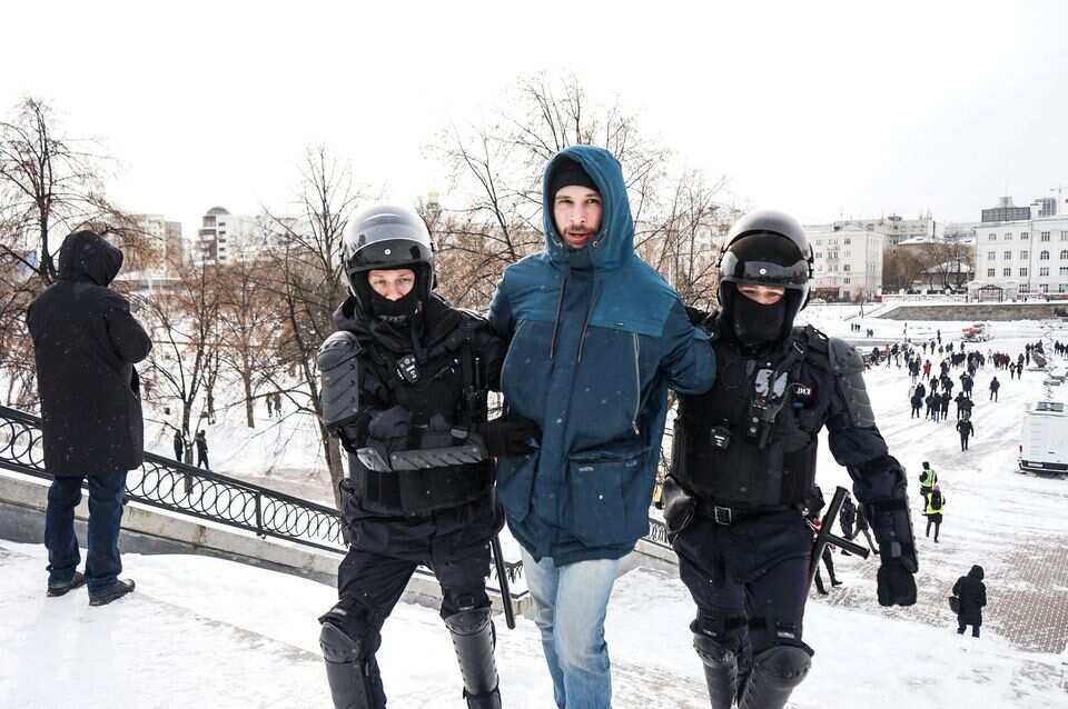 A person is detained during an anti-war protest, following Russia's invasion of Ukraine, in Yekaterinburg, Russia March 6, 2022. 