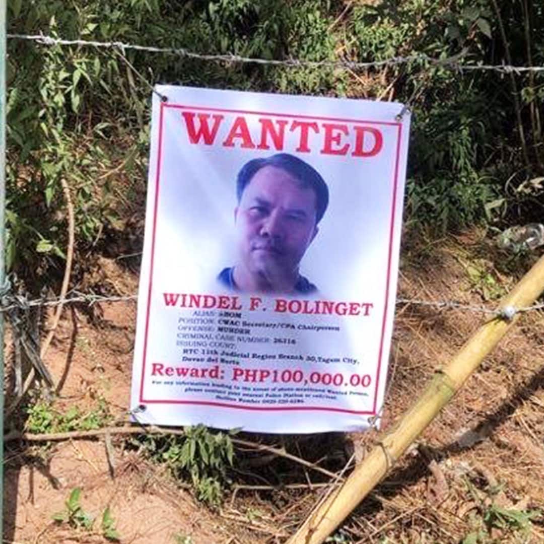 A poster with a headshot of a Filipino man and text reading: Wanted, Windel F. Bolinget and Reward: 100,000 Phillippine pesos 