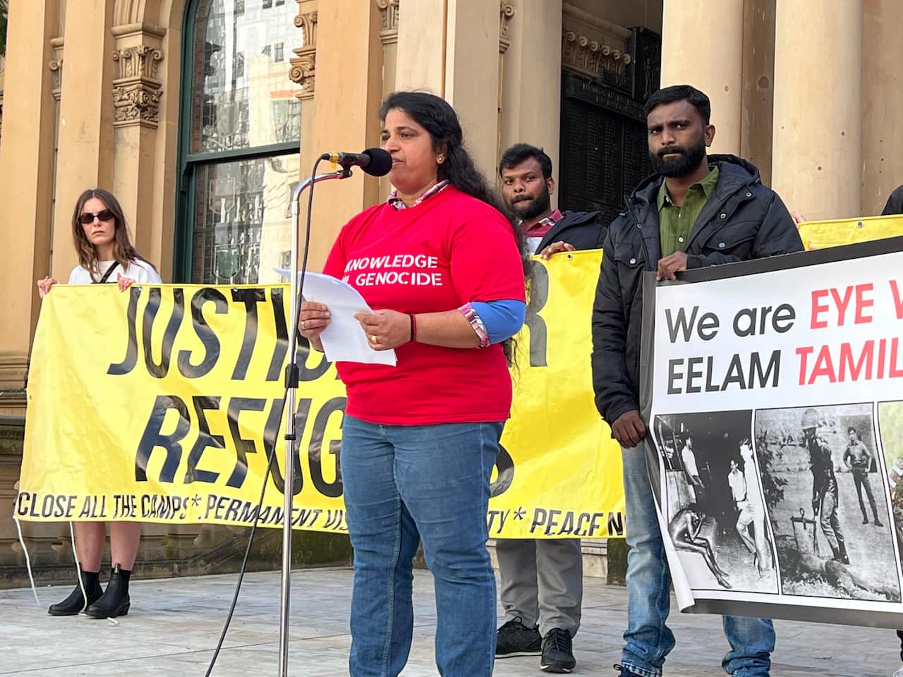 A refugee delivering a speech at a refugee rally in Sydney