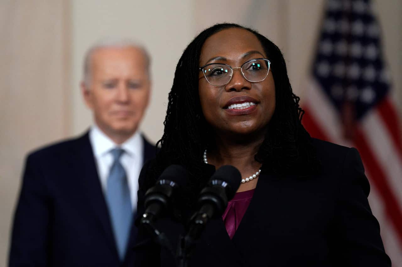 Judge Ketanji Brown Jackson speaks next to US President Joe Biden