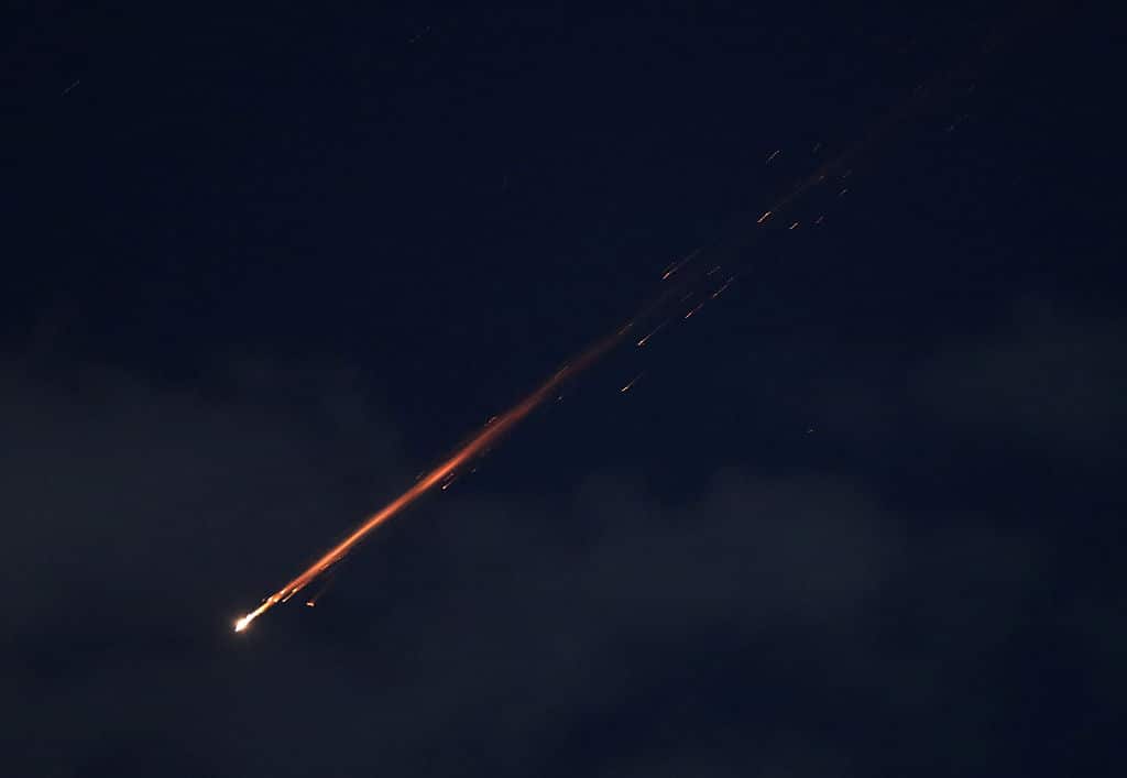 A live missile followed by a trail of fire and sparks