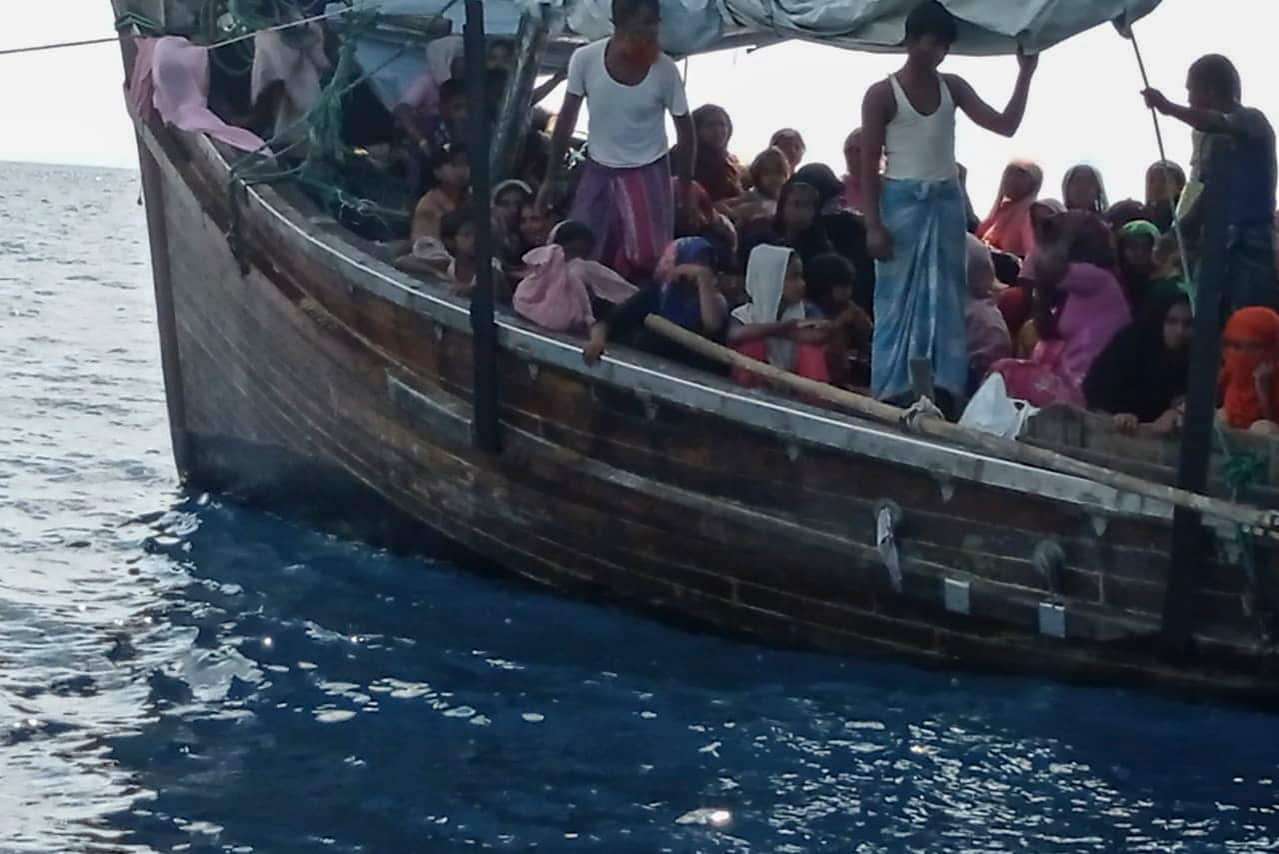 Rohingya refugees on a wooden boat off Bireuen, Aceh province, Indonesia 