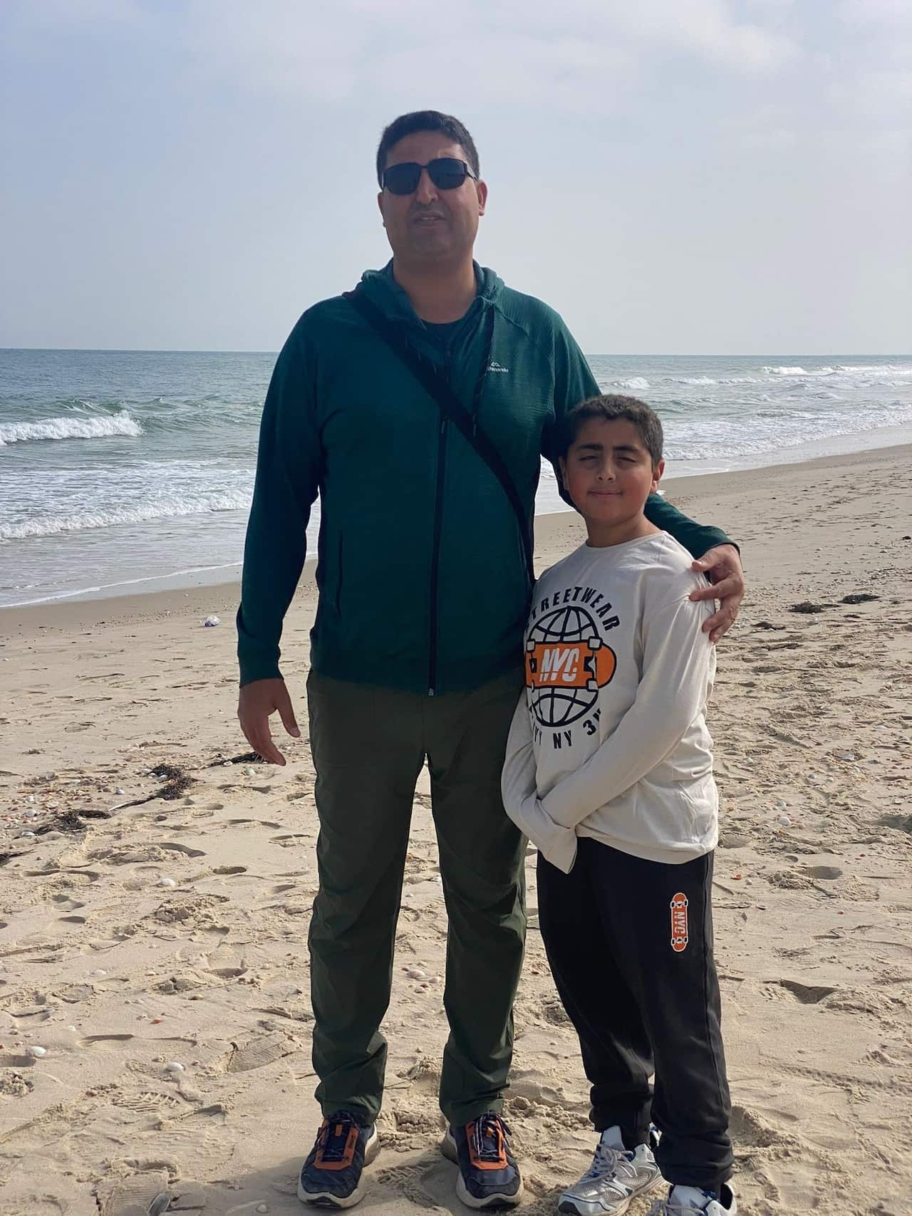 Ayman Dahlan with his yougest son.jpg