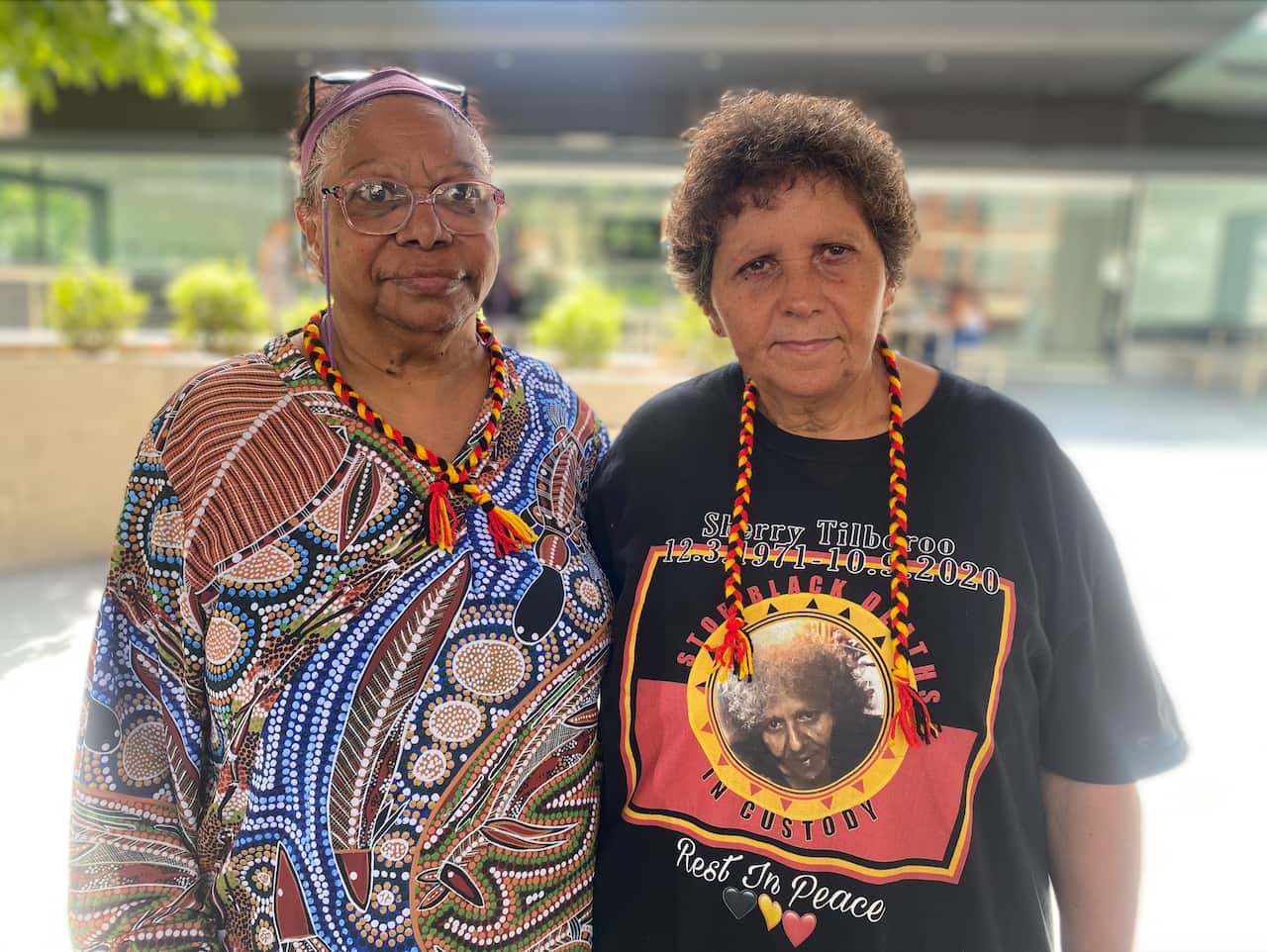 Aunty Davina and Aunty Kathy Fisher-Tilberoo stood hand in hand as they delivered a heartfelt statement before the coroner on Tuesday.