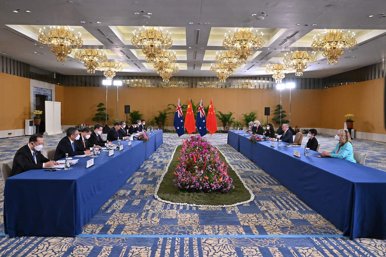 The Australian and Chinese delegations sitting at tables opposite each other in a bilateral meeting at the G20 Summit.