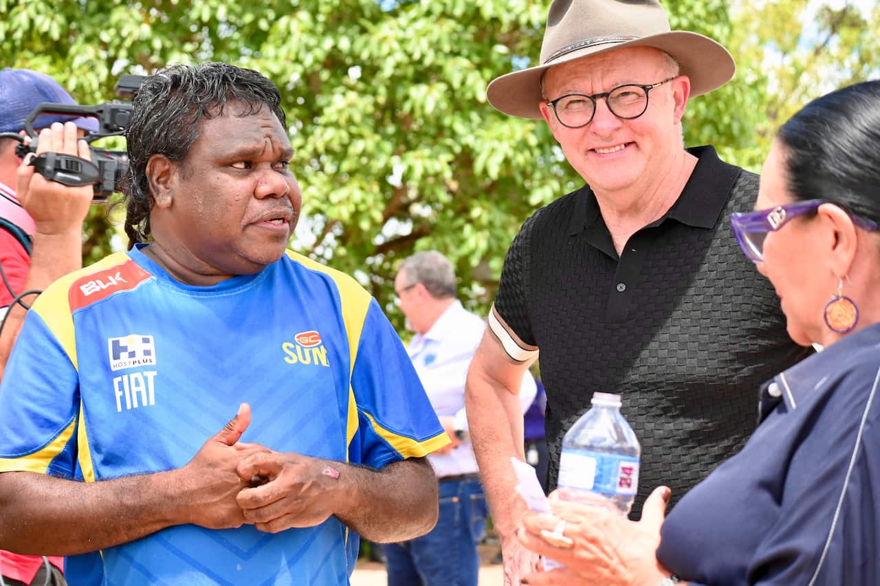 The Prime Minister Anthony Albanese with painter Tony Wurramara in the community of Binjari in the Northern Territory
