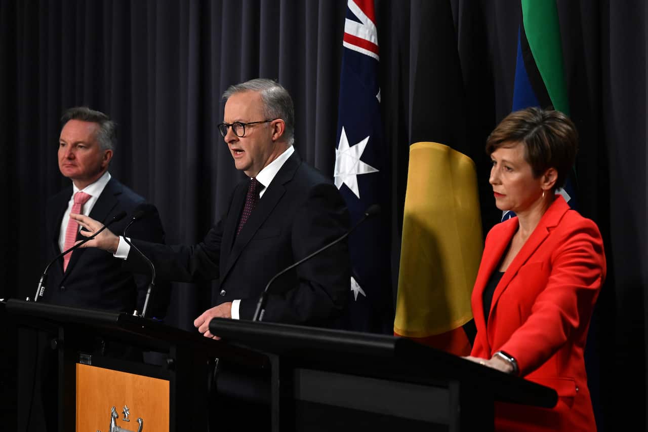 Climate Change & Energy Minister Chris Bowen, Prime Minister Anthony Albanese, and Assistant Minister for Climate Change & Energy Jenny McAllister in a room