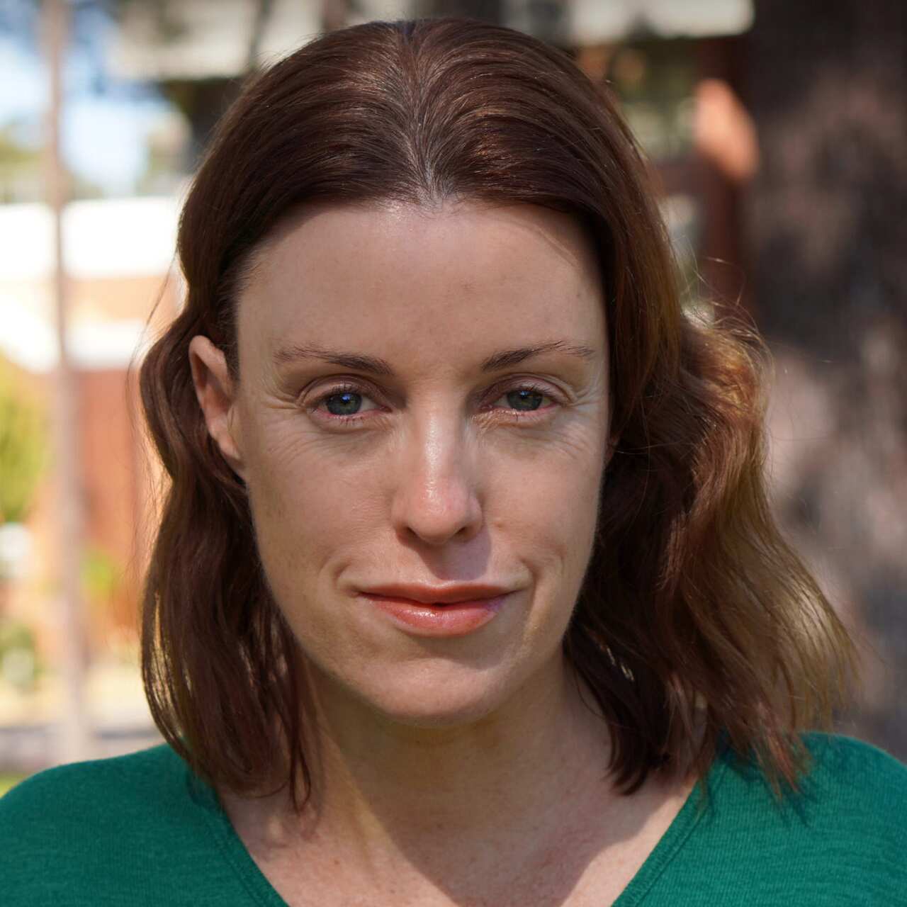 A close-up head shot of Kathryn Shine. 