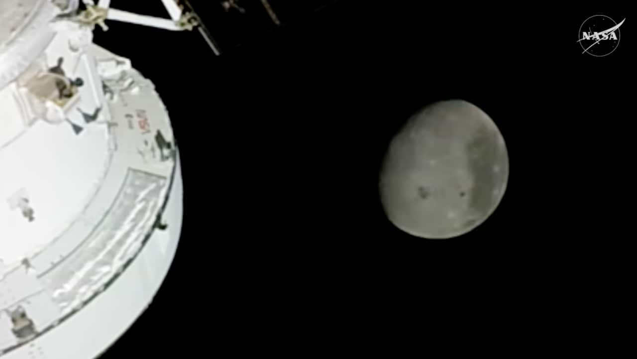 The moon and a satellite seen from space.
