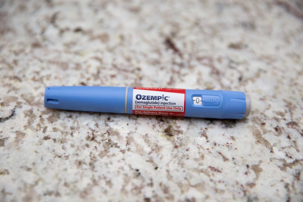 A blue pen-like device