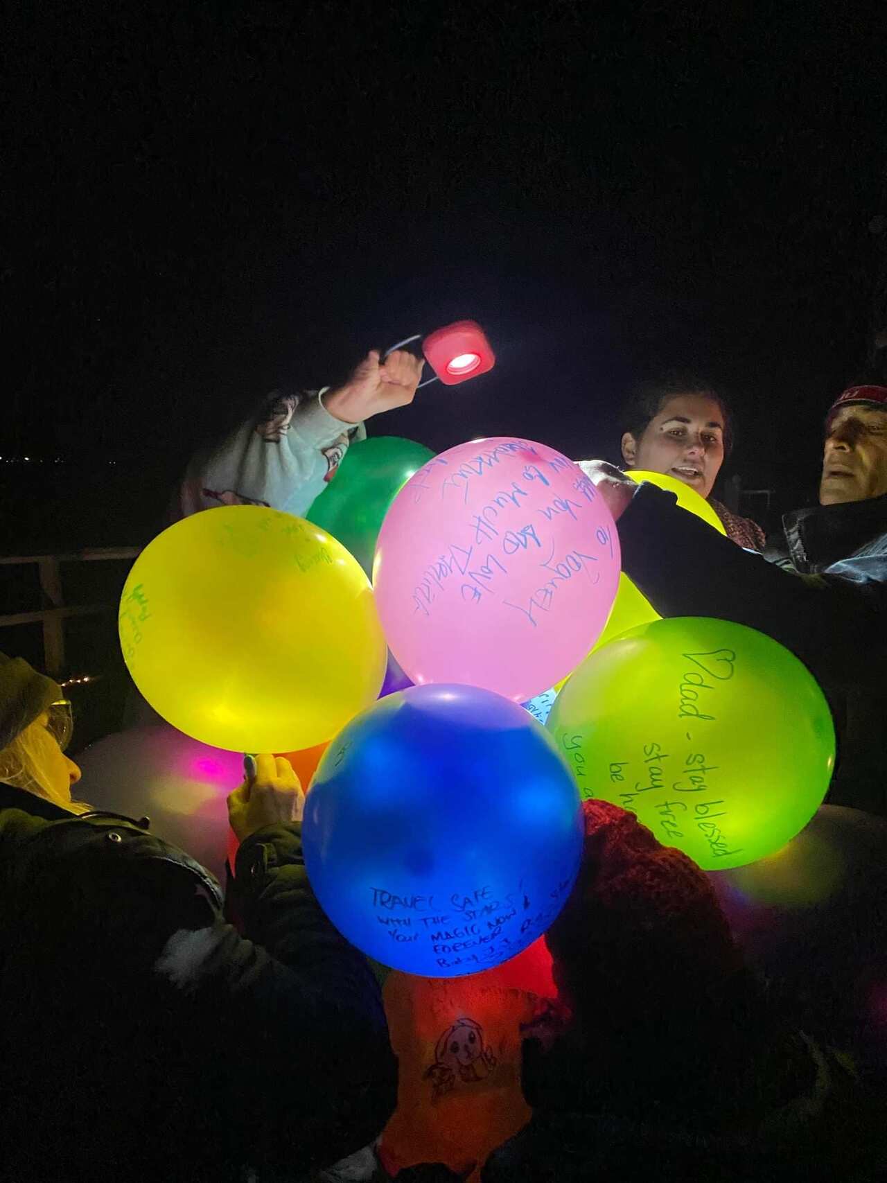 Maori community in Newcastle write messages to their deceased loved ones on eco-friendly balloons which are released into the sky as part of Makariti celebrations.