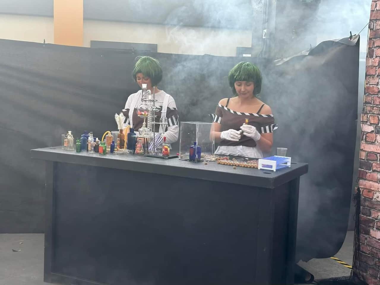 Oompa-Loompas performing "experiments" at the Willy Wonka experience in Glasgow. 
