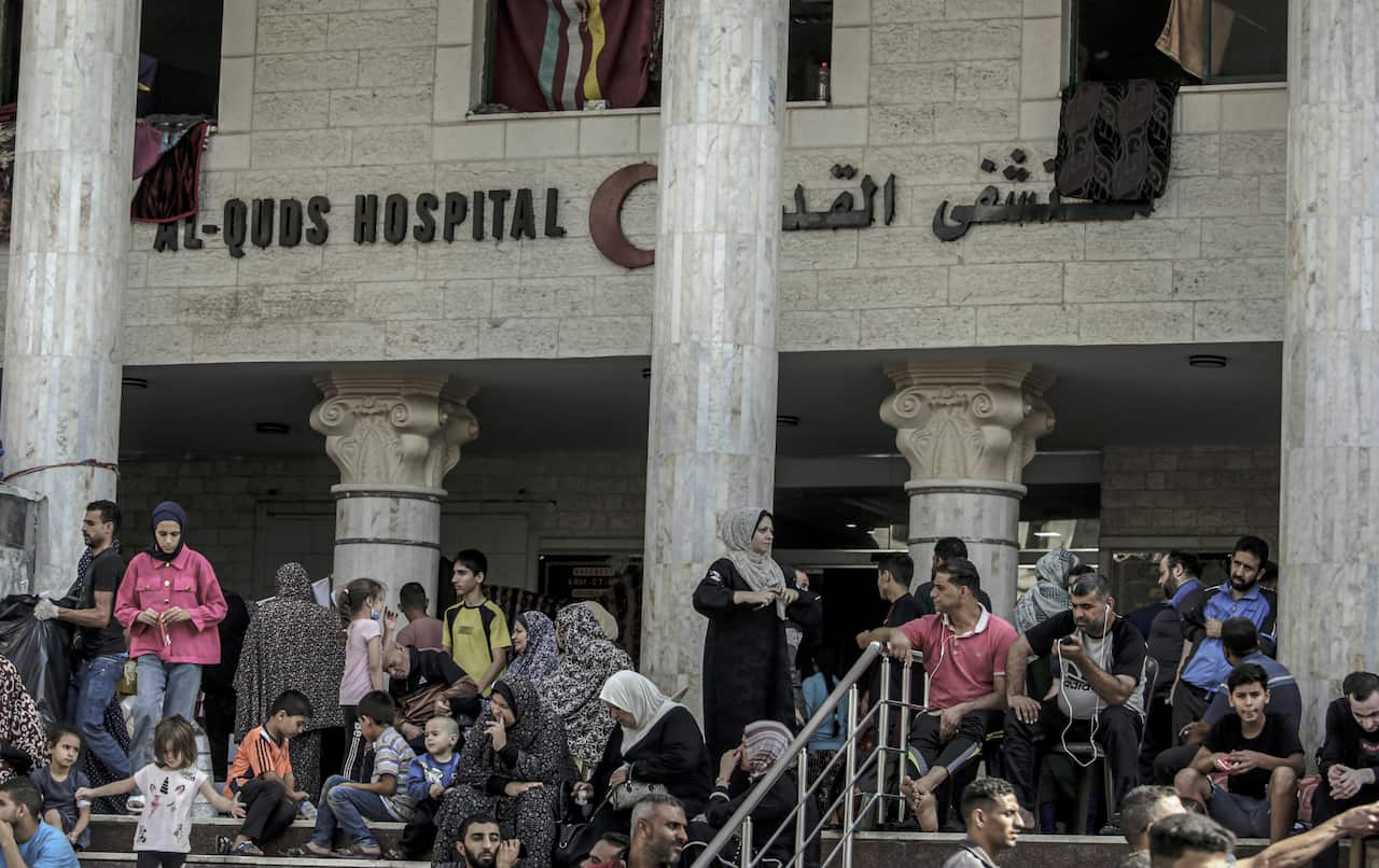 Palestinians taking shelter underneath al-Quds hospital.