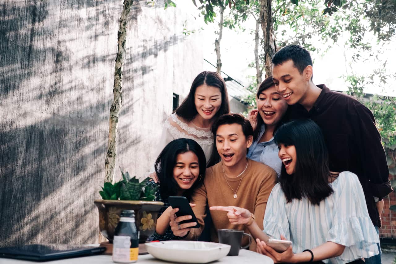 Group of Young Asian People with Smartphone