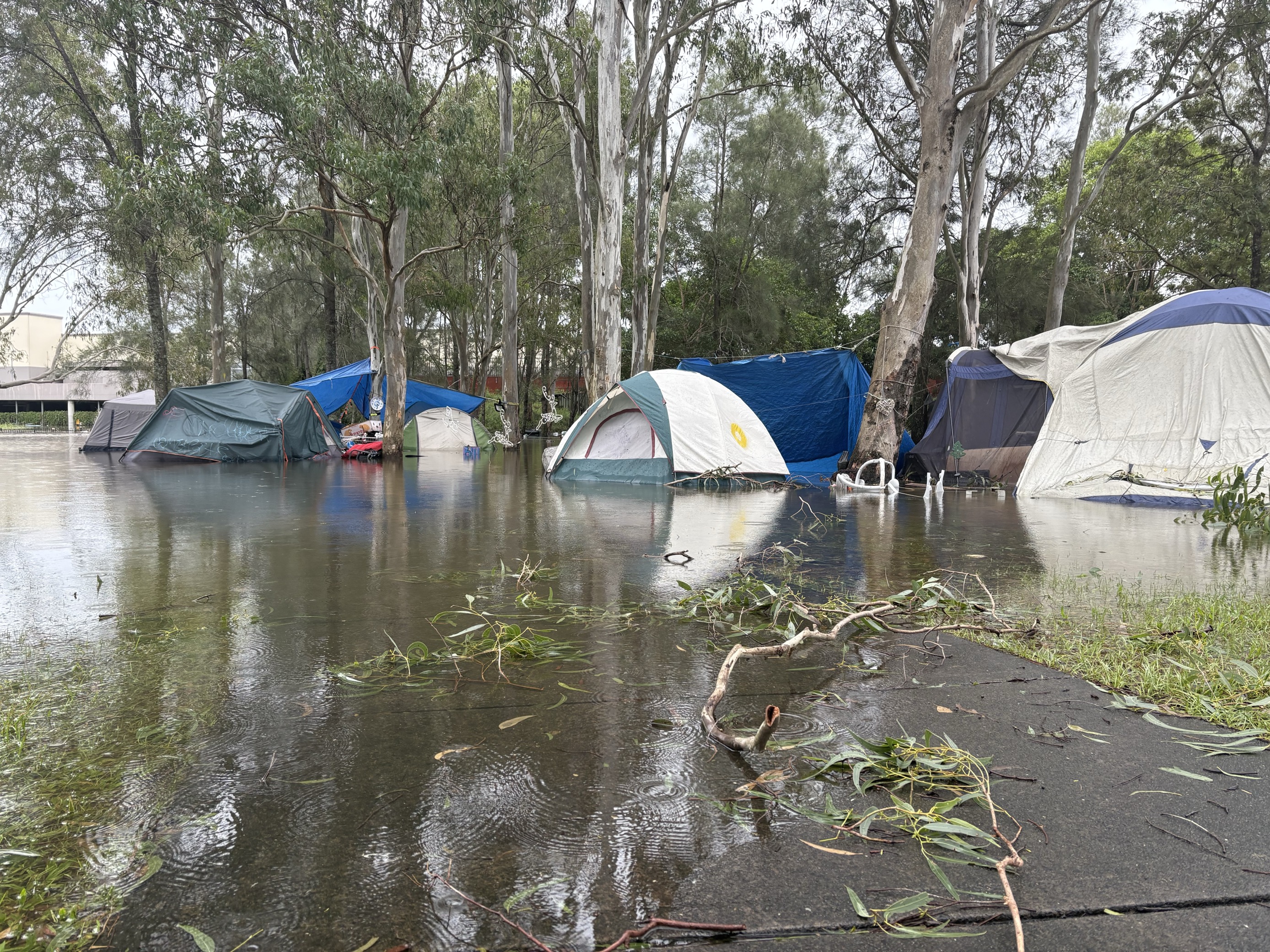 Floodwaters inundating tents