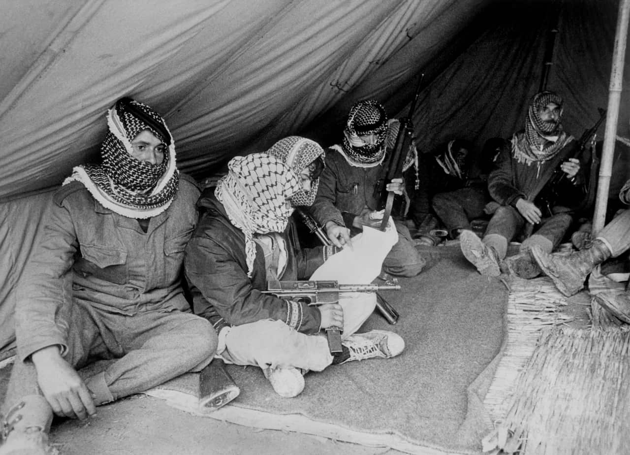 Fatah militiamen rest under a tent close to the Jo