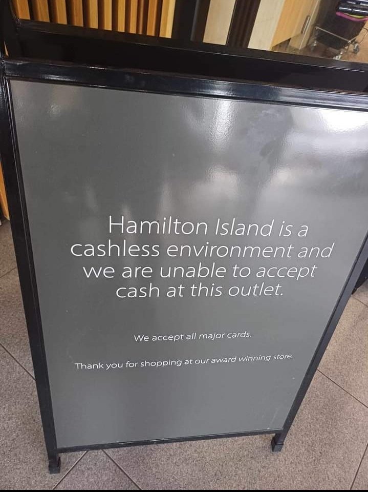 A sign explaining that Hamilton Island is a cashless environment.