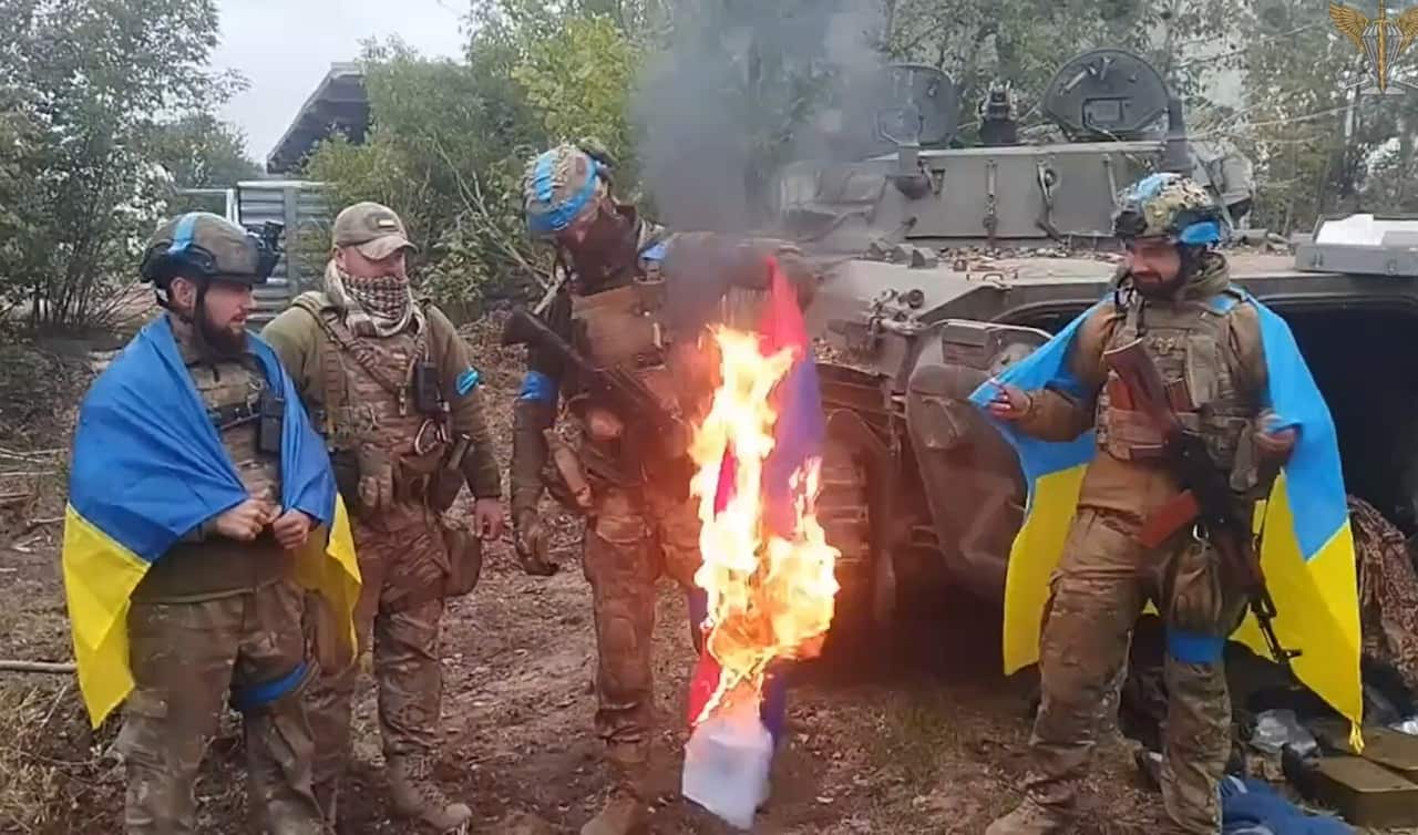 Ukrainian Troops Hoist Flag Over Recaptured Cities