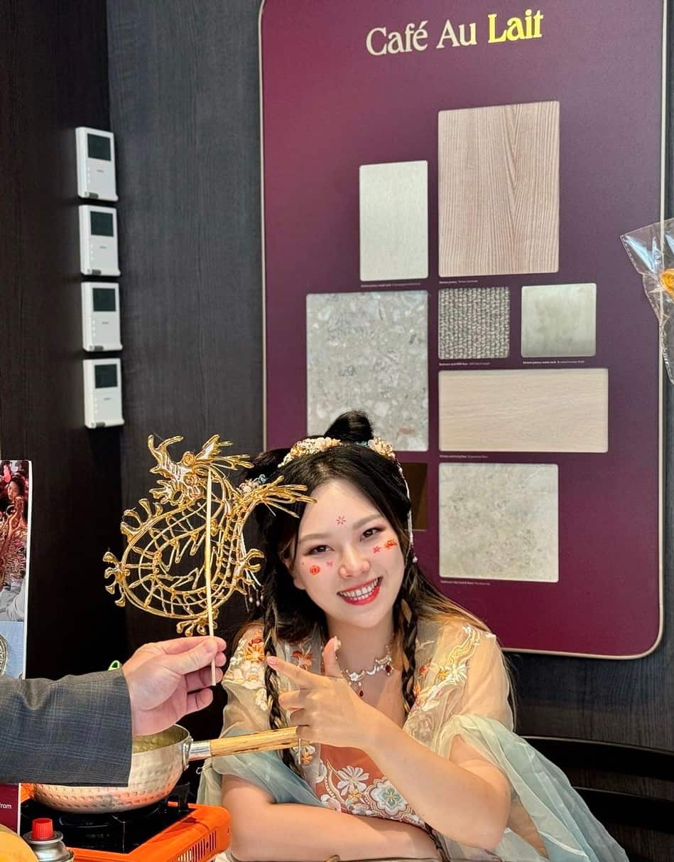 Ms. Tian and her artworks 2.jpeg