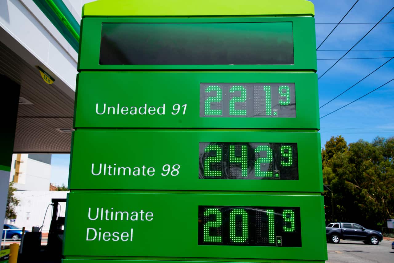 A fuel price sign listing the price of unleaded fuel as $2.21 a litre.