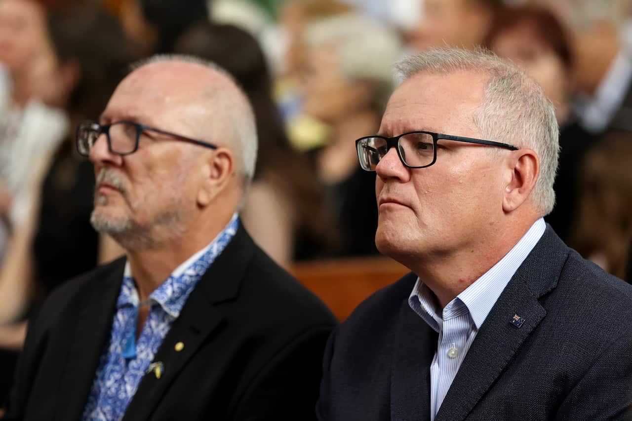 Prime Minister Scott Morrison attends a mass in support of Ukraine during a vigil in Sydney.