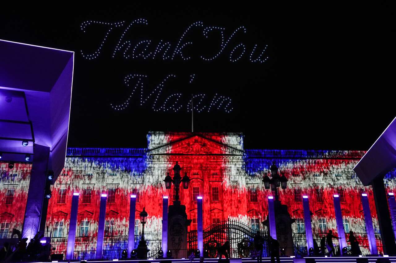 The words 'Thank You Ma'am' are illuminated over Buckingham Palace during the Platinum Jubilee concert